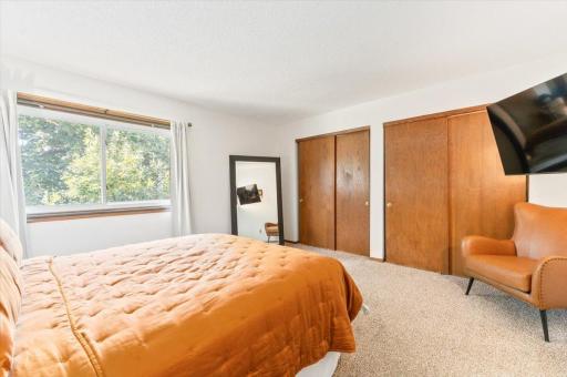 Large window overlooks backyard