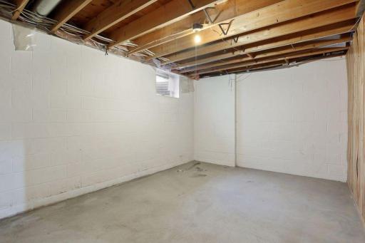 Unfinished basement is a blank slate waiting for your special touch