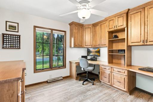 Main level office with window looking to the front of the home