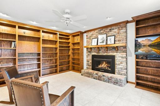 Family room with large built ins and a beautiful stone fire place!