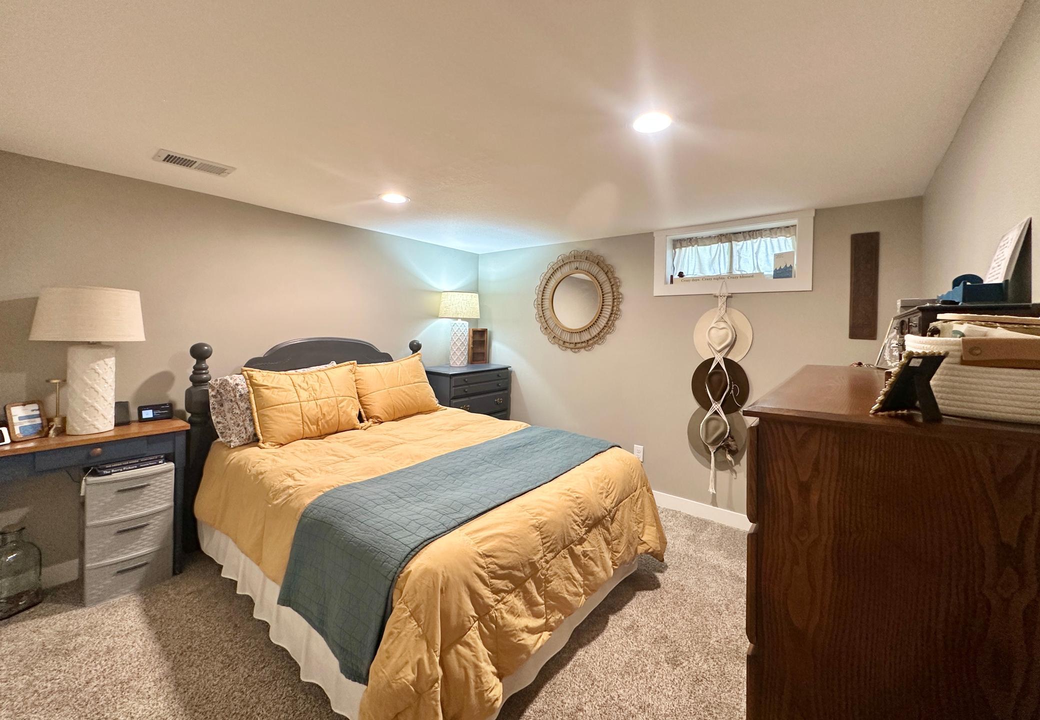 The lower level is currently being used as a 4th bedroom.