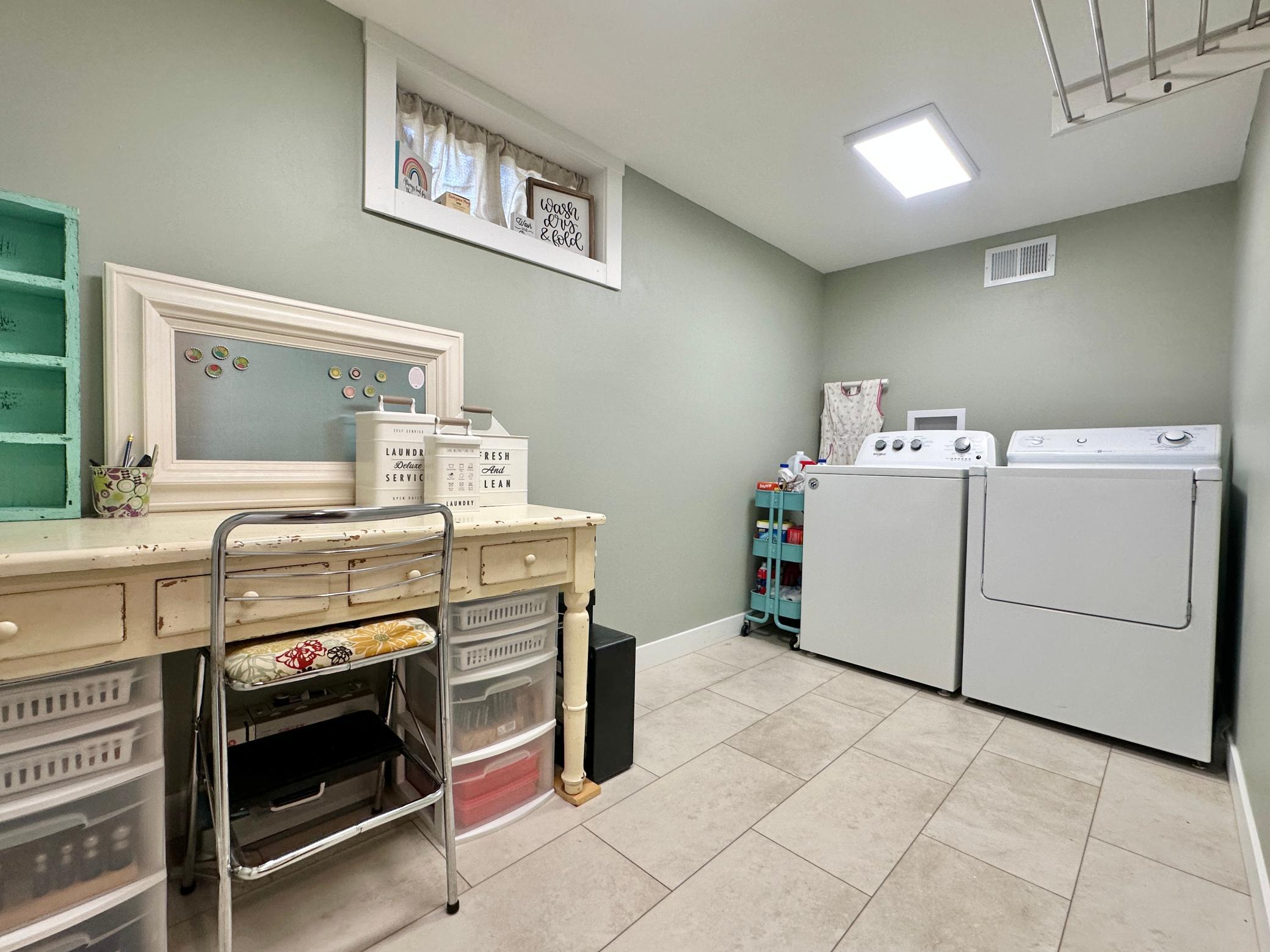 The laundry area has extra space to use as you wish.