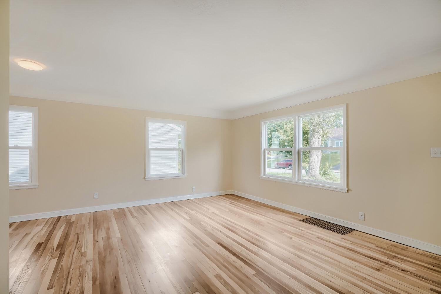 7711 Division St - Sit back and enjoy this thoughtfully restored property where every major update has already been completed including fresh paint throughout, major appliances, plumbing and electrical.