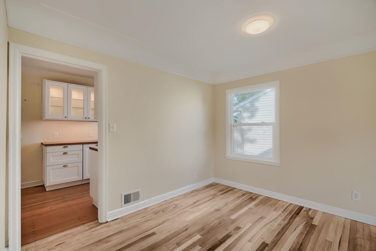 7711 Division St - Dining area is ready for family dinners or entertaining.