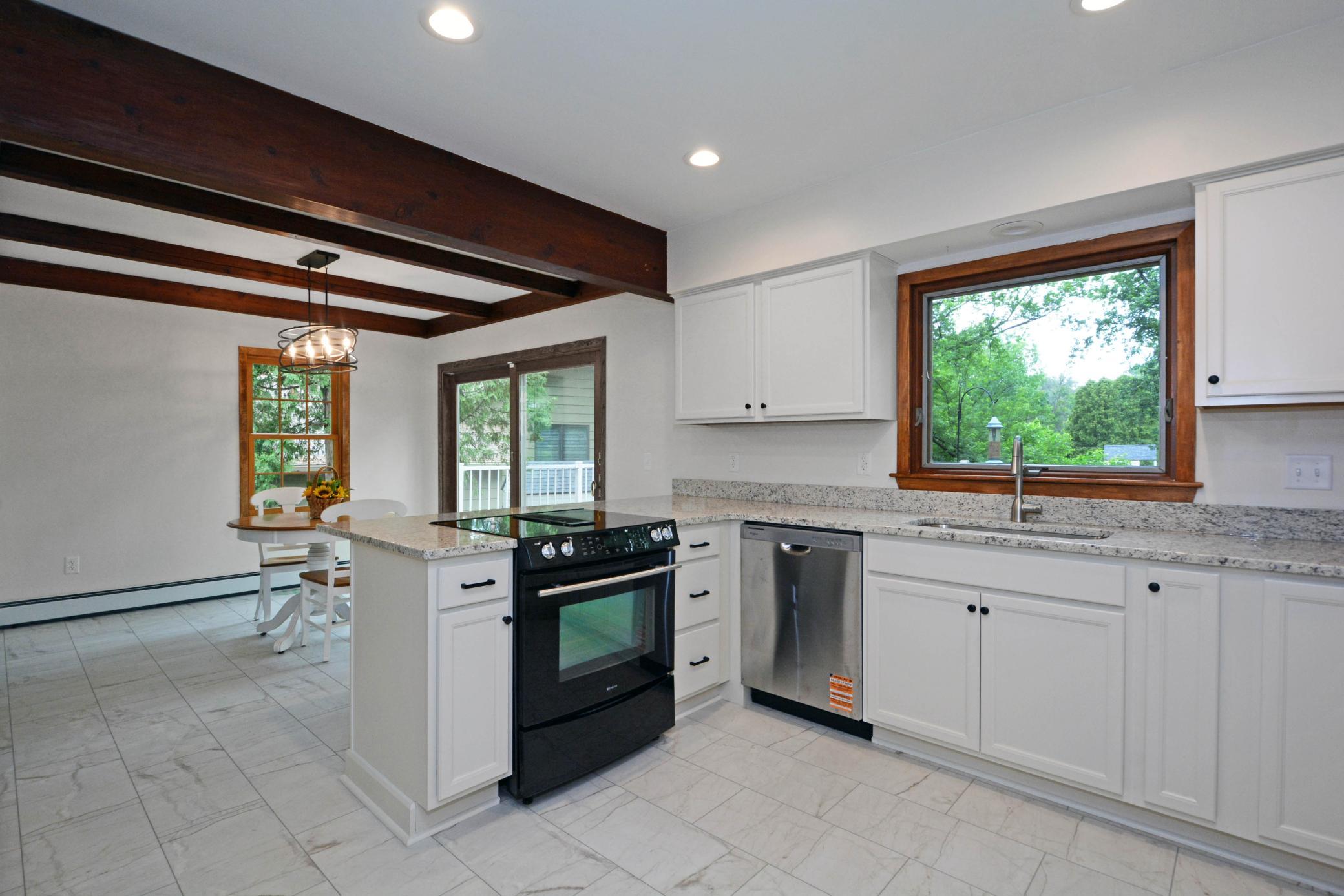 New cabinets/granite counter tops and flooring