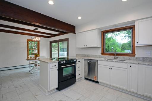 New cabinets/granite counter tops and flooring