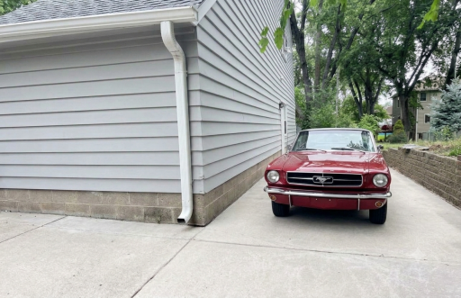 Extra concrete parking pad for your toys!