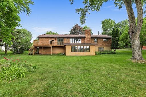 This Walk-Out Ranch Style Home Sits on a .43 Acre Lot Overlooking Undeveloped Green Space
