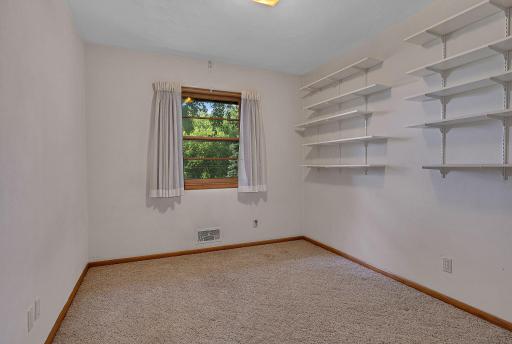 Bedroom Three - 9'1" x 12'11" - Attached Shelving to Stay