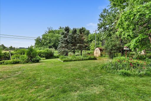 Flower Gardens Throughout the Yard - Storage Shed will Stay