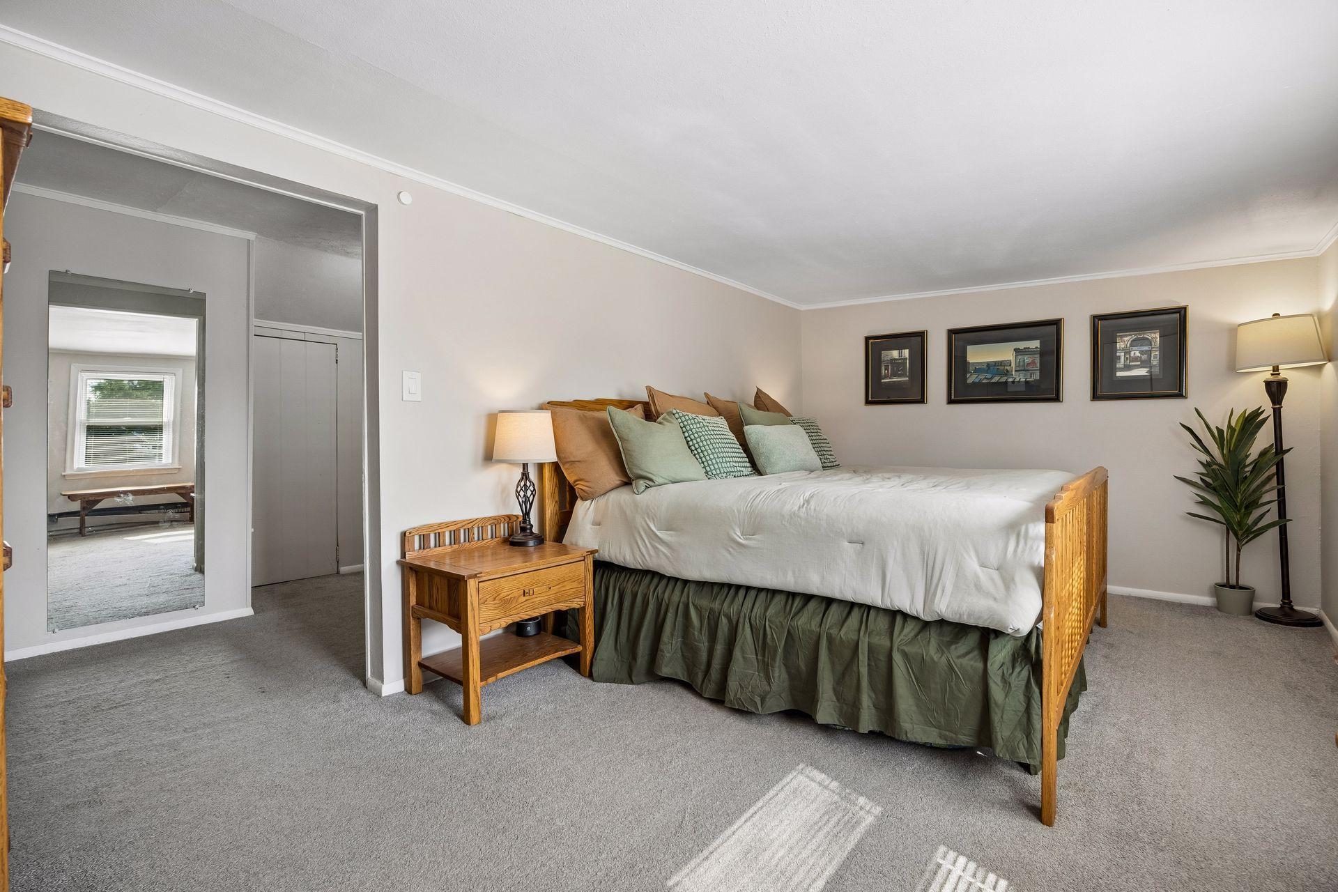 A true owner's retreat. Occupying the entire upper level, the spacious primary suite offers exceptional privacy, and generous bedroom space plus a sitting area, dedicated dressing area and half bath.