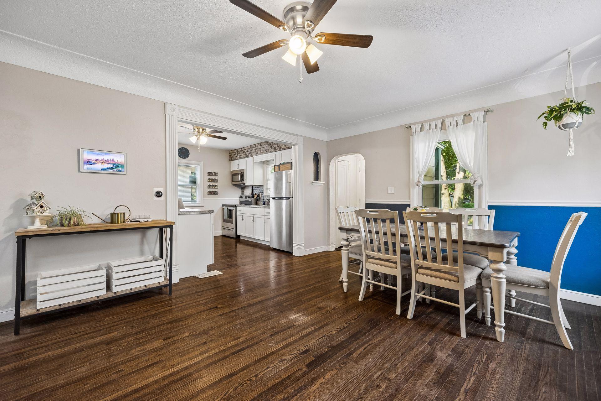Gather, celebrate, and make memories. The generously sized dining room features beautiful vintage hardwood floors and flows seamlessly into the updated kitchen, making entertaining effortless.