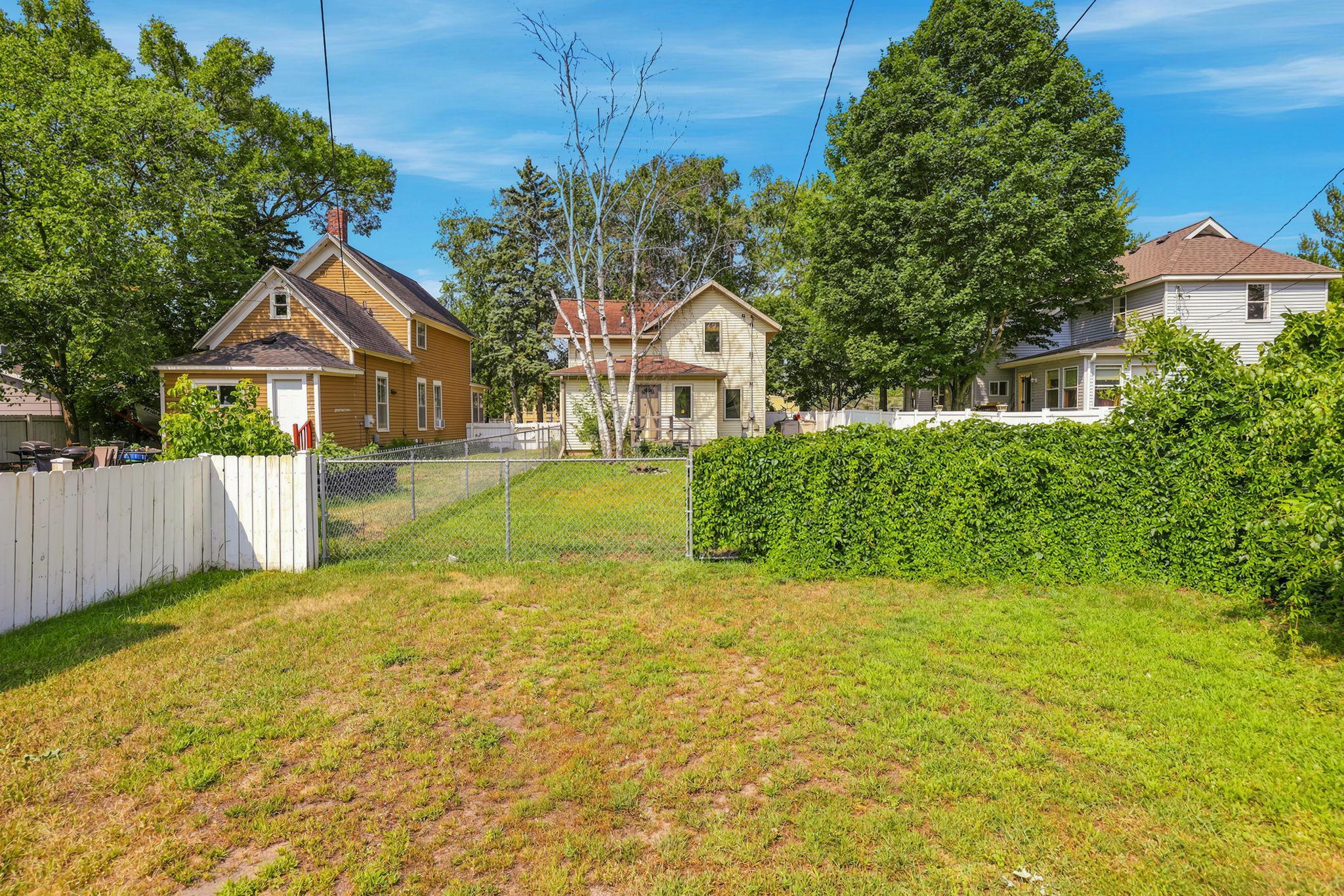 Large fenced backyard with off-street parking available