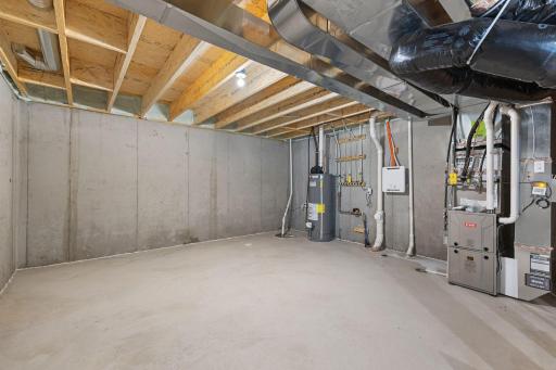Unfinished lower level. Tankless water heater! High efficiency HVAC system.