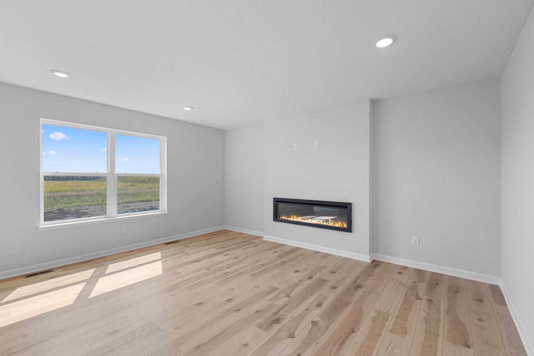 Family Room with fireplace. Photo used for layout purposes. Finished may be different.