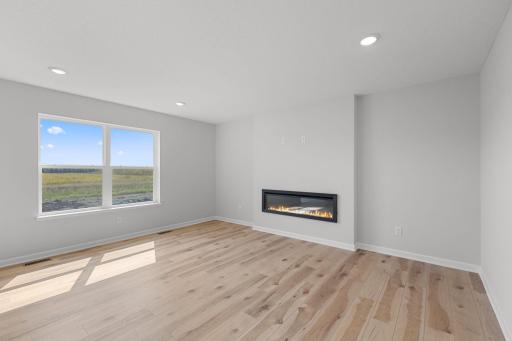Family Room with fireplace. Photo used for layout purposes. Finished may be different.