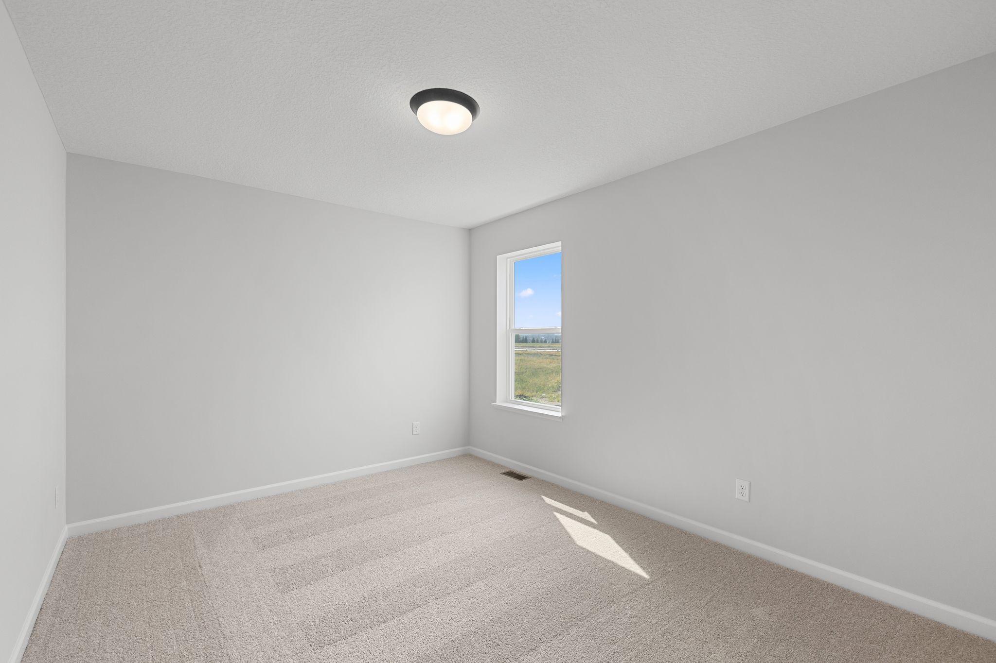 Bedroom 3 upstairs. Photo used for layout purposes. Finishes may be different.