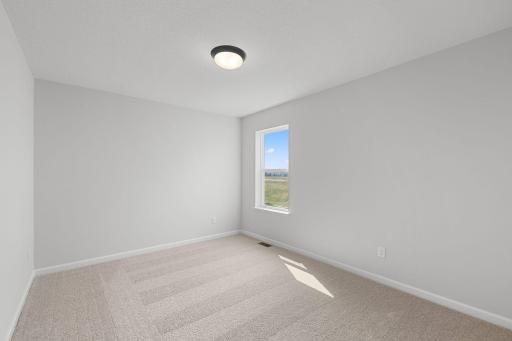 Bedroom 3 upstairs. Photo used for layout purposes. Finishes may be different.
