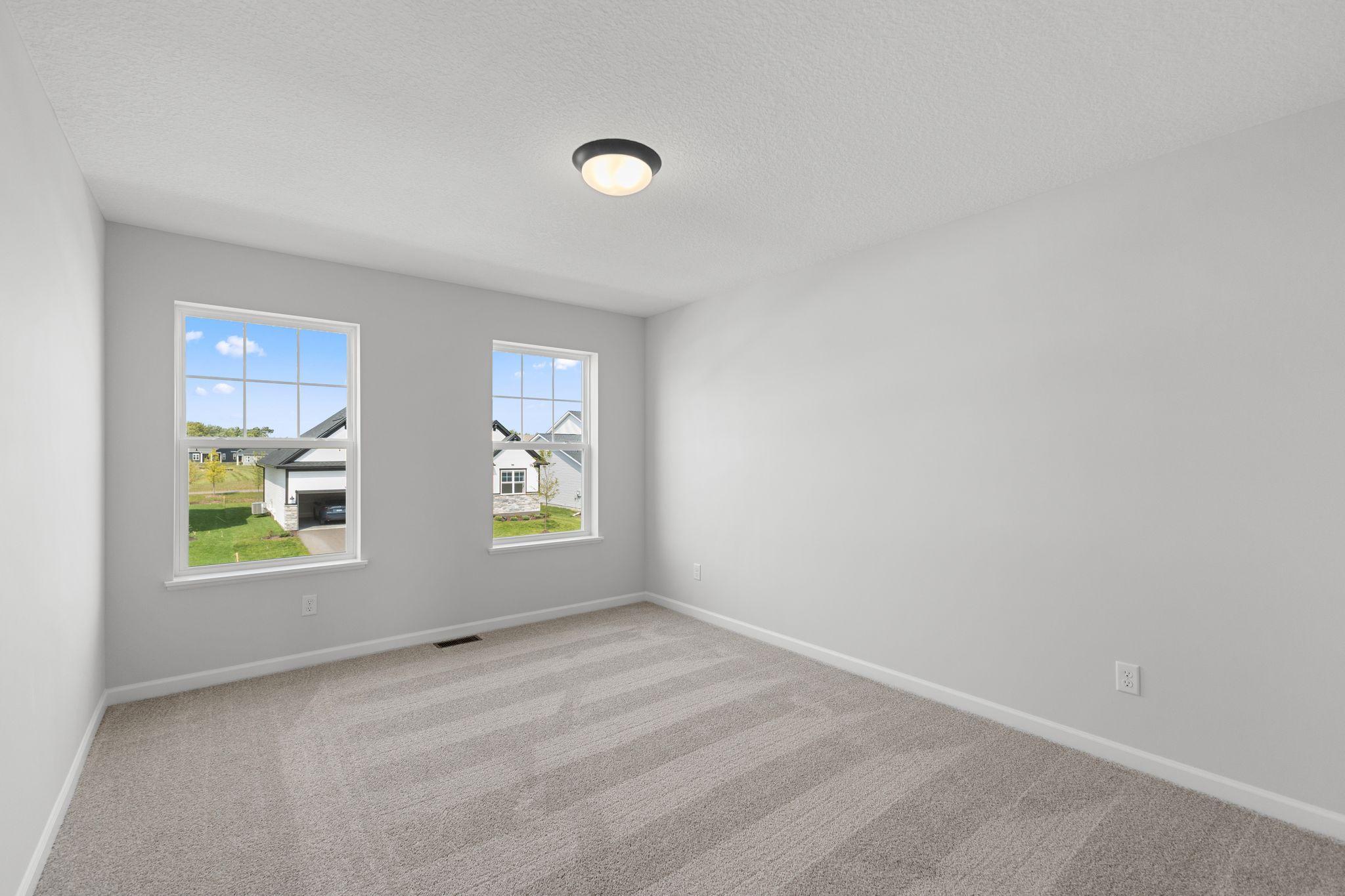 Bedroom 4 upstairs. Photo used for layout purposes. Finishes may be different.