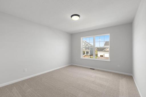 One of 4 upstairs bedrooms! Photo used for layout purposes. Finishes may be different.