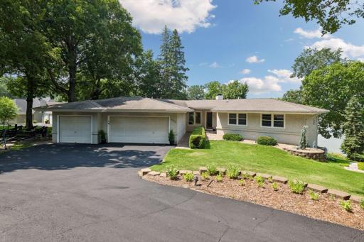 Front of home provides 3 car garage and low maintenance landscaping