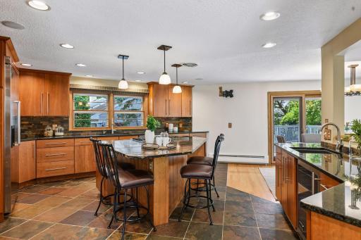Large granite countertops and island in the kitchen