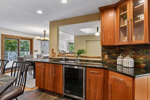 Wet bar sits within the kitchen, great for hosting and keeping your bar setup separate