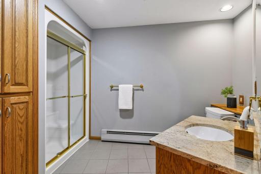 Large main floor bath off entry from garage going into the kitchen and across from the laundry room