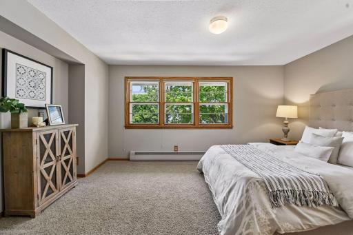 One of three main floor bedrooms, this the larger one sitting off the back of the home