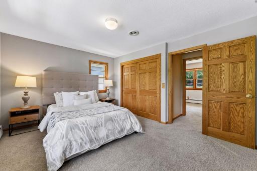 Ample windows and closet space in this bedroom