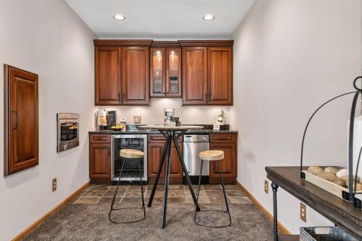 Lower level wet bar great for hosting and coming in off the lake
