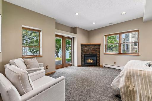 Fireplace and walkout from lower level owners bedroom