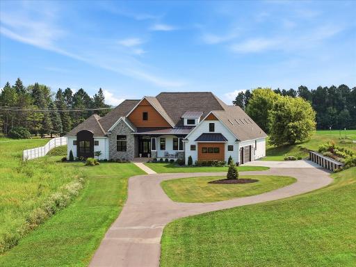 4 Acres with private drive to circular driveway and side garage access