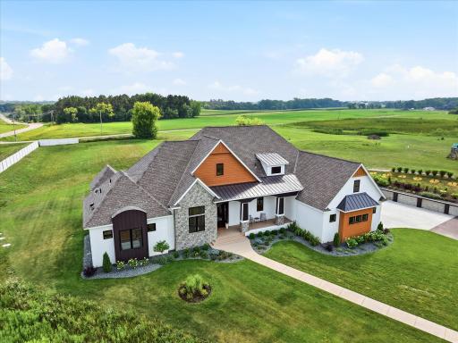 4 Acres with private drive to circular driveway and side garage access