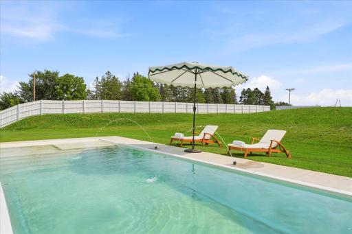 Heated pool in the very private backyard.