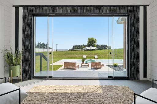Retractable wall of glass to bring the outside in