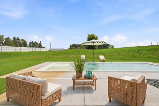 Heated pool with large patio. very private backyard