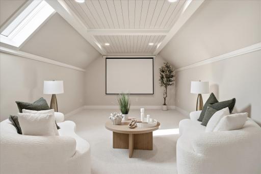 Add a retracting projection screen for big screen movie nights in this Entertainment loft
