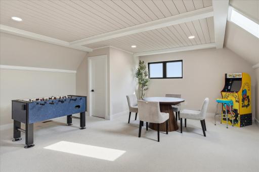 The entertainment loft includes rec room with full bar and half bath