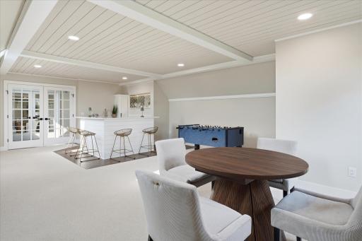 The entertainment loft includes rec room with full bar and half bath
