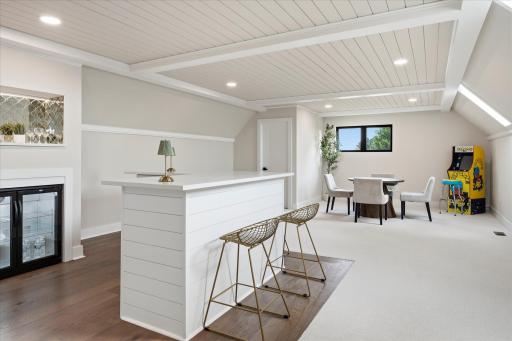 The entertainment loft includes rec room with full bar and half bath