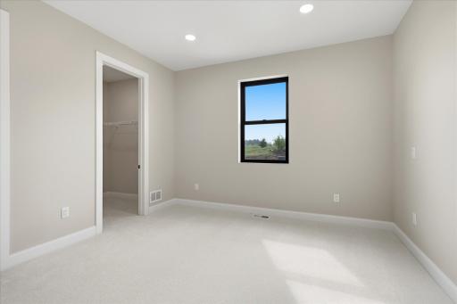 Bedroom 3 with walk-in closet and Jack + Jill Bath