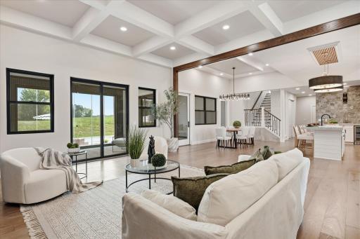 Enter into this stunning home that feels like a personal retreat with 12 foot ceilings and every detail designed for entertaining
