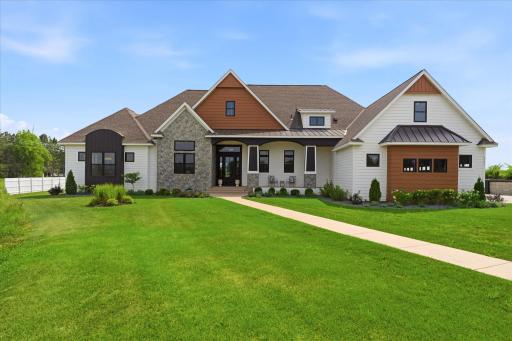4 Acres with private drive to circular driveway and side garage access
