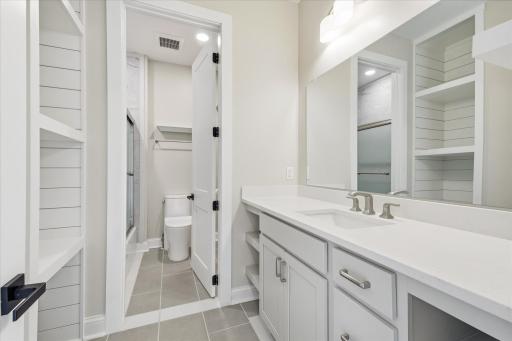 Bedroom 4 - Private vanity with shared Jack + Jill shower