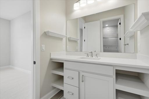Bedroom 3 - Private vanity with shared Jack + Jill shower