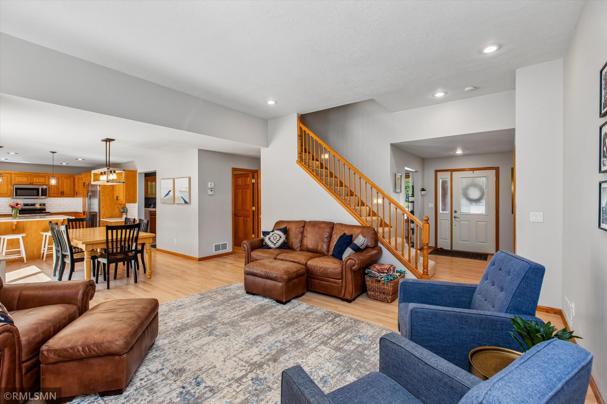 Living Room - main floor has gorgeous newly refinished hardwood flooring