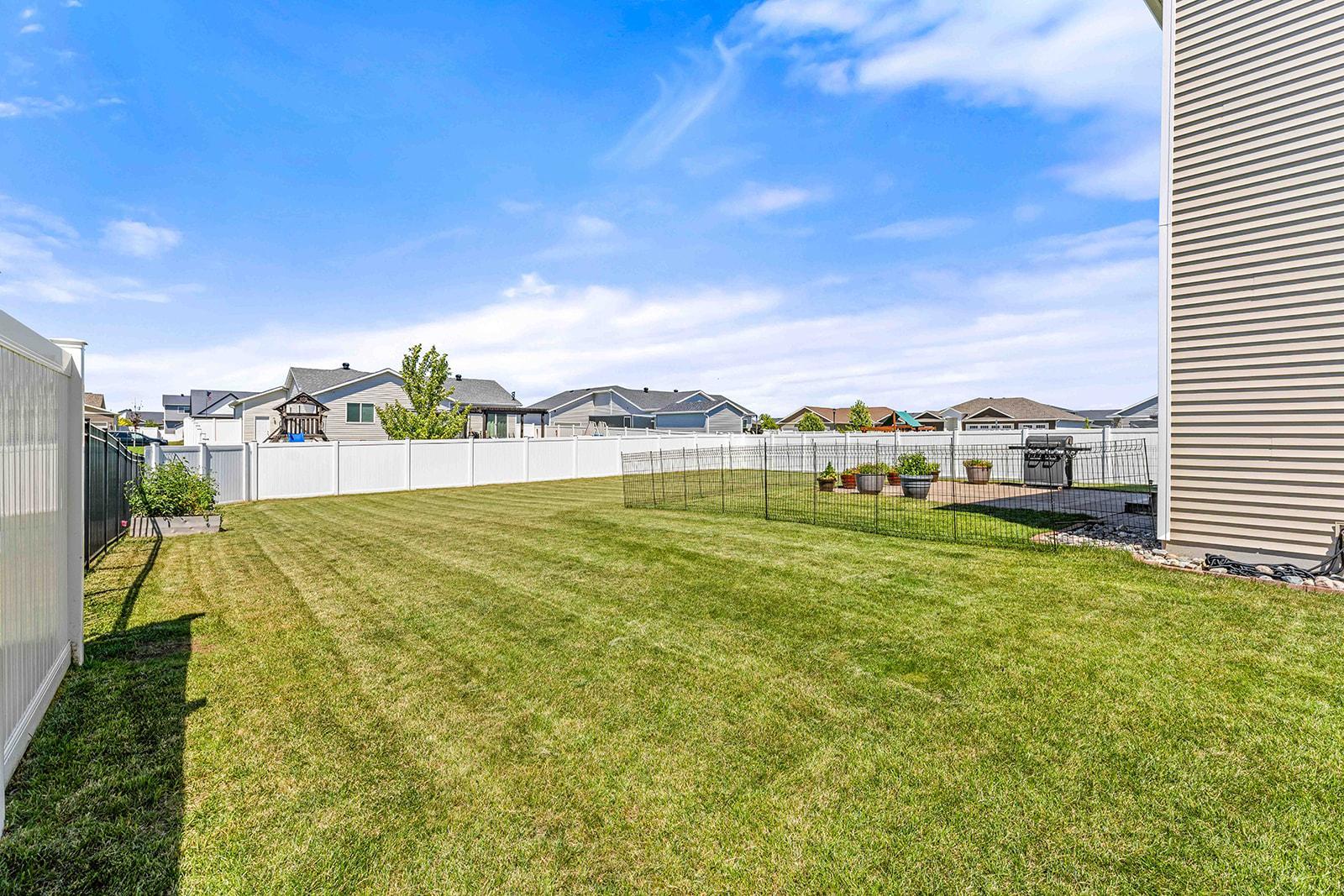 Fully Fenced Yard with Sprinkler System