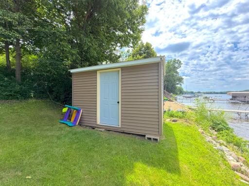 A lakeside storage shed offers the ease of having space to store all your lake toys just steps from waters' edge, what more do you need?