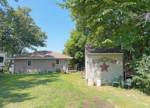 Tucked among mature trees on the shores of Lake Francis, this property offers exceptional privacy with peaceful lake views and a welcoming setting.